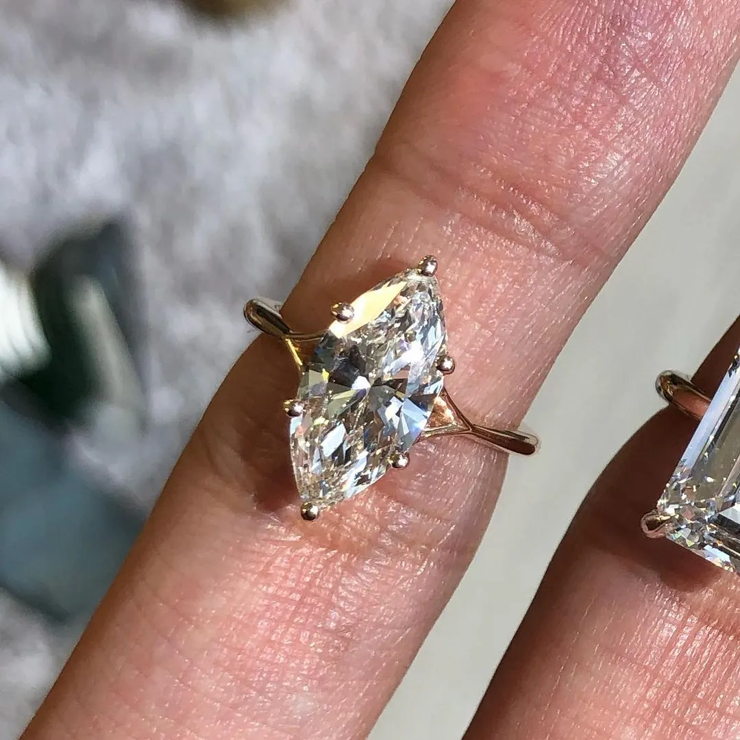 /public/photos/live/Sparkle Marquise Cut Moissanite Dainty Split Shank Ring 651 (1).webp